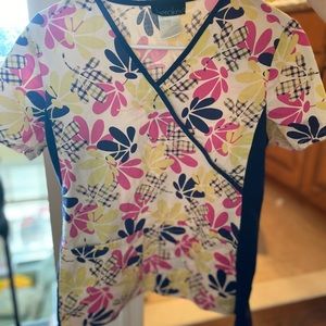 Cherokee xs scrub top with flower pattern